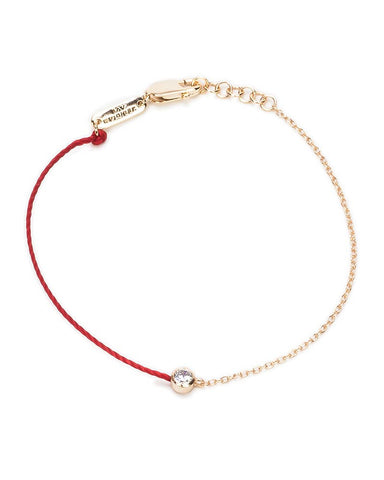 red string bracelet with gold and cz