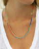 blue and orange beaded necklace on