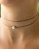 pearl choker necklace on